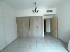 Central air conditioning, three bedrooms and a living room, built-in wall cabinets, open view, close