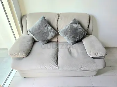 2‑Seater Fabric Sofa + 2 Pillows – Good Condition – Only AED 550