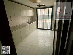 Two bedrooms and a living room for annual rent in Sharjah, Al Qasimia, in Al Naqbi building. Rent is