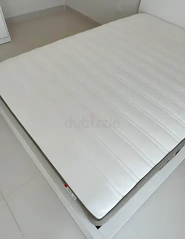 IKEA Malm Queen size bed frame with ikea mattress.