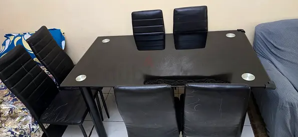 Black Glass Dining Table with Chairs.