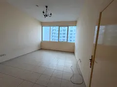 Built-in wall wardrobes, free air conditioning, two bedrooms and a living room in Al Taawun, open vi