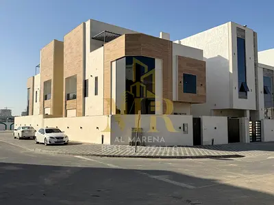 فيلا للبيع | فيلا على شارعين | في منطقة الحليو 2،بعجمان | تصميمات وتشطيبات عالية الجودة | واجهة من الحجر الزجاجي | السعر يشمل رسوم التسجيل والتملك فيل