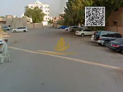 For sale in Ajman, Al Nuaimiya 2 residential/investment land (G+4), area 520 meters (5600 feet), cor
