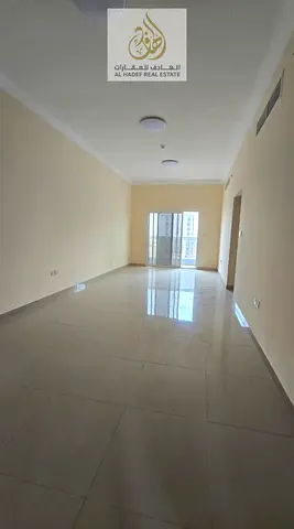 Annual rent in Ajman, Al Jurf 3 area, near Wadlam Park School. New building, suitable for families. Two-bedroom apartment with a living room, balcony,