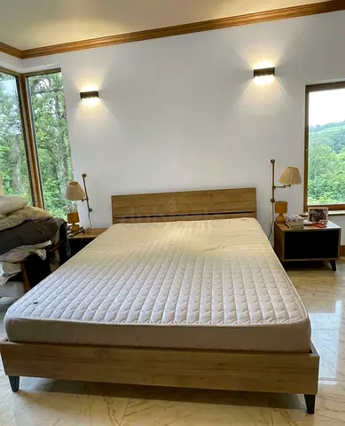 Large 180 × 200 Bed Set, good condition, mattress included. Ideal for a couple or family bedroom.