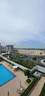 A stylish one-bedroom apartment with a living room is available for rent with a beautiful pool and g