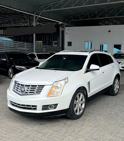 كاديلاك SRX موديل 2015 خليجي V6  بحاله ممتازه نظيفه مالك اول بدون حوادث ماشي 184 الف كيلو تشييكات كل