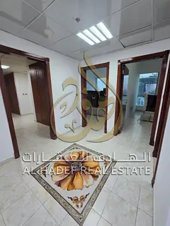 For rent in Al Majaz 3: 3 bedrooms and a living room, converted into 4 bedrooms, plus a maid's r