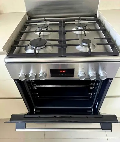 Bosch top gas oven is electric latest model same like new condition