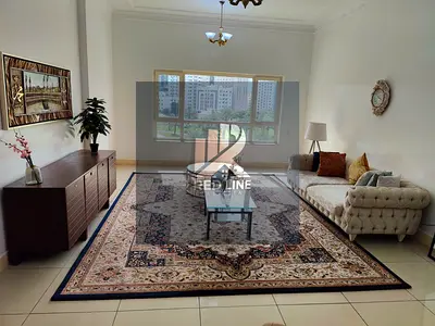 3-bedroom apartment with a living room for rent in Al Majaz 3, directly opposite Safia Park, with a panoramic view of the park from all rooms