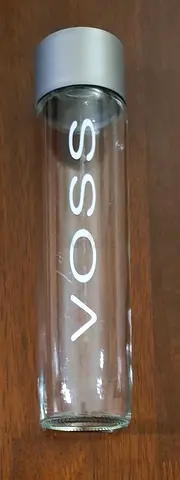 Empty Voss Water Glass Bottle