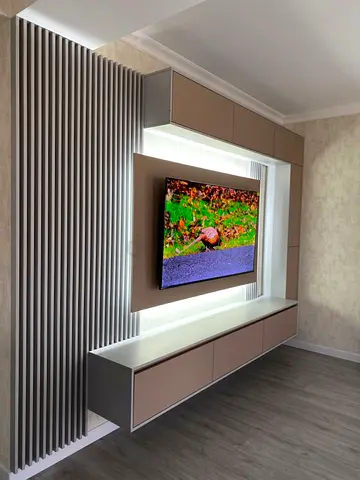 Elegant Fluted Media Wall with Integrated Backlighting