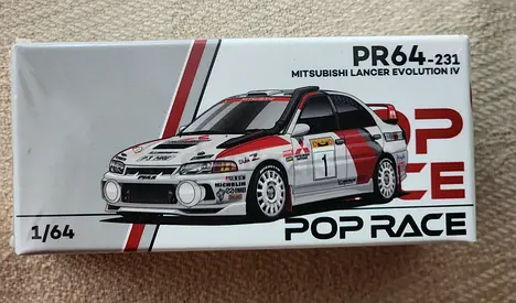 Poprace Mitsubishi Lancer Evolution IV Diecast 1/64