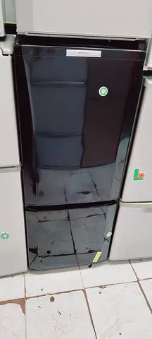 Black Mitsubishi fridge bottom freezer under warranty