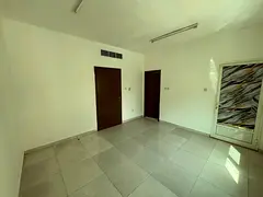 1BR + hall, 2 baths, balcony, spacious, Al Nuaimiya 2, King Faisal St, Ajman, 30K AED, 4 payments, 2