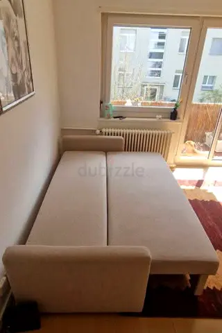 Beige Fabric 3-Seater Sofa Bed – A space-saving solution with a modern look that fits perfectly in
