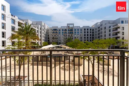 Balcony overlooking sparkling pool Bright & Airy