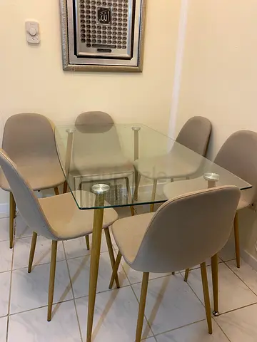 Modern Glass Dining Table with Stylish Chairs