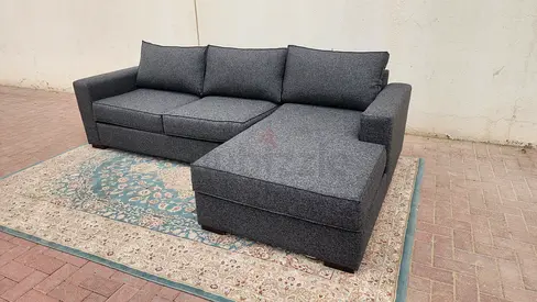 L-shaped configuration ideal for corner placement, maximizing seating in any living space. Material