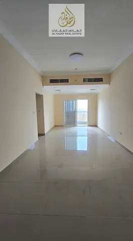 Annual rent in Ajman, Al Jurf 3 area, near Wad Dolam Park School. New building, suitable for families. Two-bedroom apartment with a living room, balco
