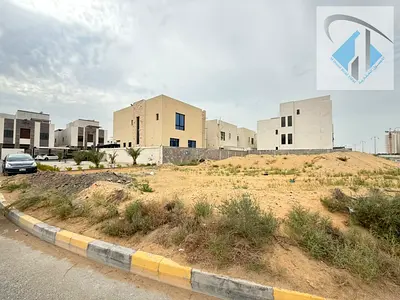 Corner plot of land for sale in Al Yasmin area, commercial zone, with a permit for a medical center (ground floor + two floors).