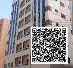 A distinctive investment building in the Al Nuaimiya 2 area of ​​Ajman. It boasts a