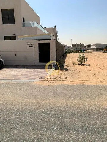 Residential land for sale in Al-Hawshi area, prime location near a mosque and park. Building permit available for a villa (ground floor + first floor)