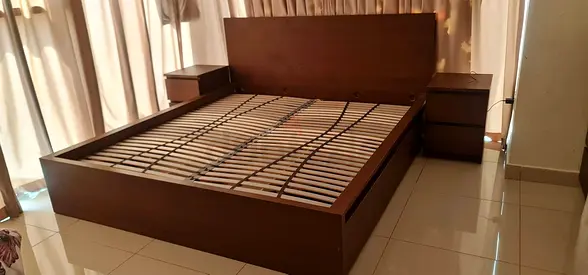 Ikea king size bed with mattress underneath 2 storage drawers available in perfect condition