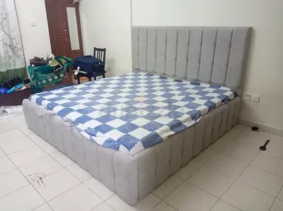 Stylish King Size Bed with Plush Headboard