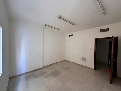 One-Bedroom Apartment with Living Room for Annual Rent in Al Naeemia 2 Ajman with 2 Bathrooms Balcony Spacious Practical Layout Prime Location on King