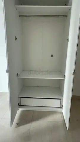 New wardrobe from home center white color with mirrors