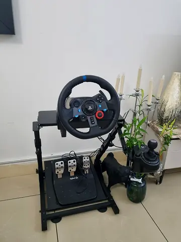 (G29 DRIVING WHEEL):::(AND DRIVING PADEL):::(AND HAND GEAR SHIFTER):::(AND STAND):::(**CAN DISCUS**)