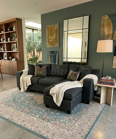 L-shaped grey sofa with left and right fitting,cushions, covers,