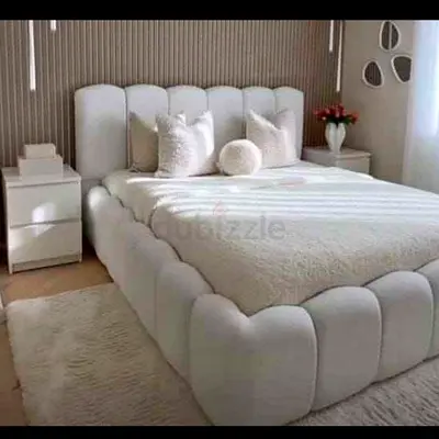 Stylish White Bed with Plush Headboard