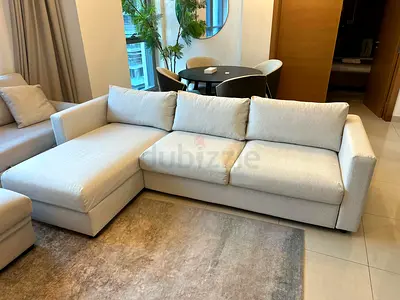 Luxury style sofa bed with soft cushions and comfortable sleeping space.