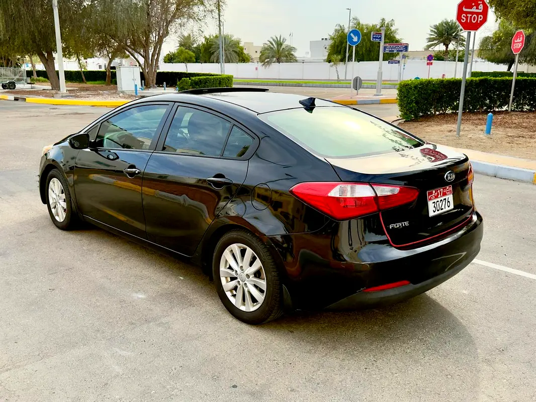 Kia Forte 2014 — photo 1 of 10