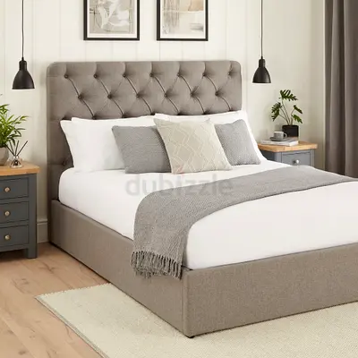 Mid-gray twin deep button storage bed