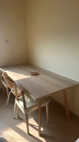 Modern and Elegant Wooden Dining Table