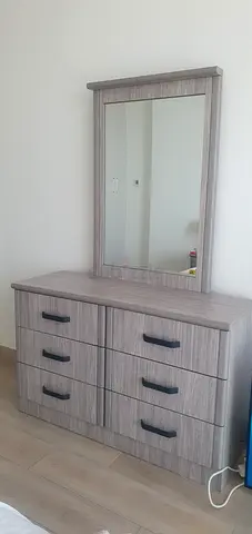 Gray dresser with mirror