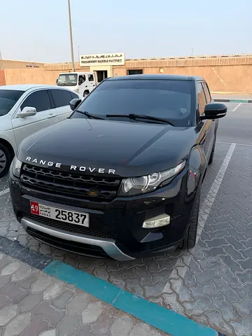 Range Rover model 2013 black color.