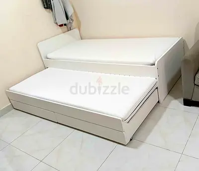 Ikea slakt bed frame with under bed and 2 storage drawers underneath with 2 Ikea mattresses