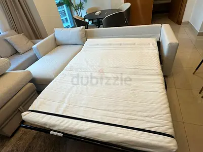 Premium fabric sofa bed with comfortable mattress and modern style.