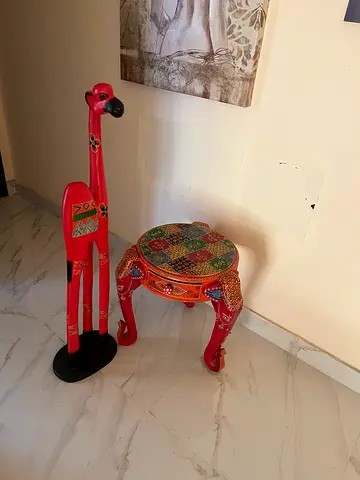 Decorative red camel and Table