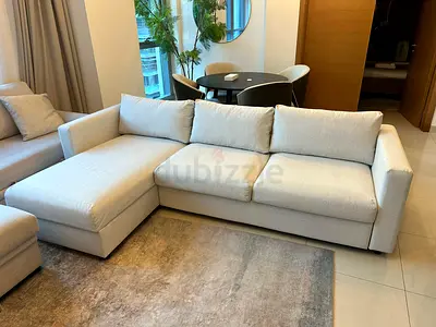 Stylish Pull-Out Sofa Bed with soft mattress. Comfortable seating and sleeping option.