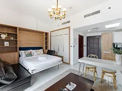 Stylish Studio Apartment with Convertible Bed | Starz Tower, Al Furjan