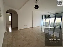Two bedrooms, including a master bedroom, large living room, spacious kitchen, two bathrooms, balcon