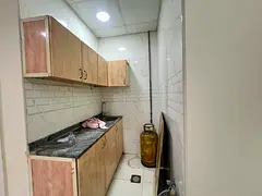 Close to muwaileh bus station studio just in 19k family building prime location