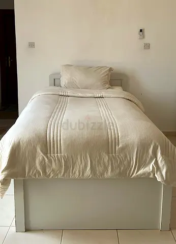 Comfortable Bed with White Bedding