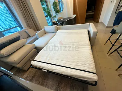 Modern sofa bed with pull-out mattress. Very comfortable and practical.